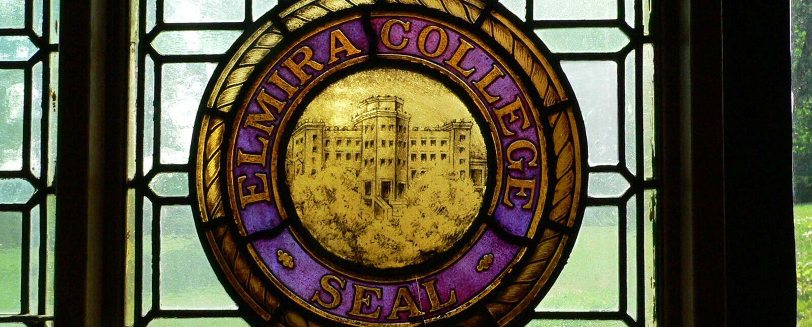 A stained glass window in the Peterson Chapel which reads, 