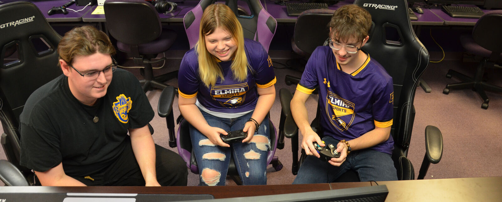 Esports competitors practice on a computer