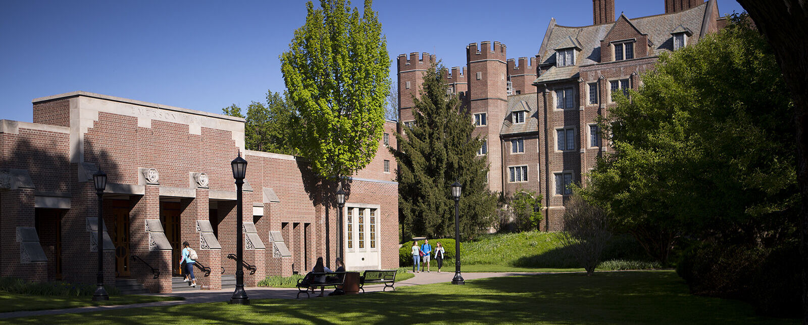 Students walk by Gibson Hall
