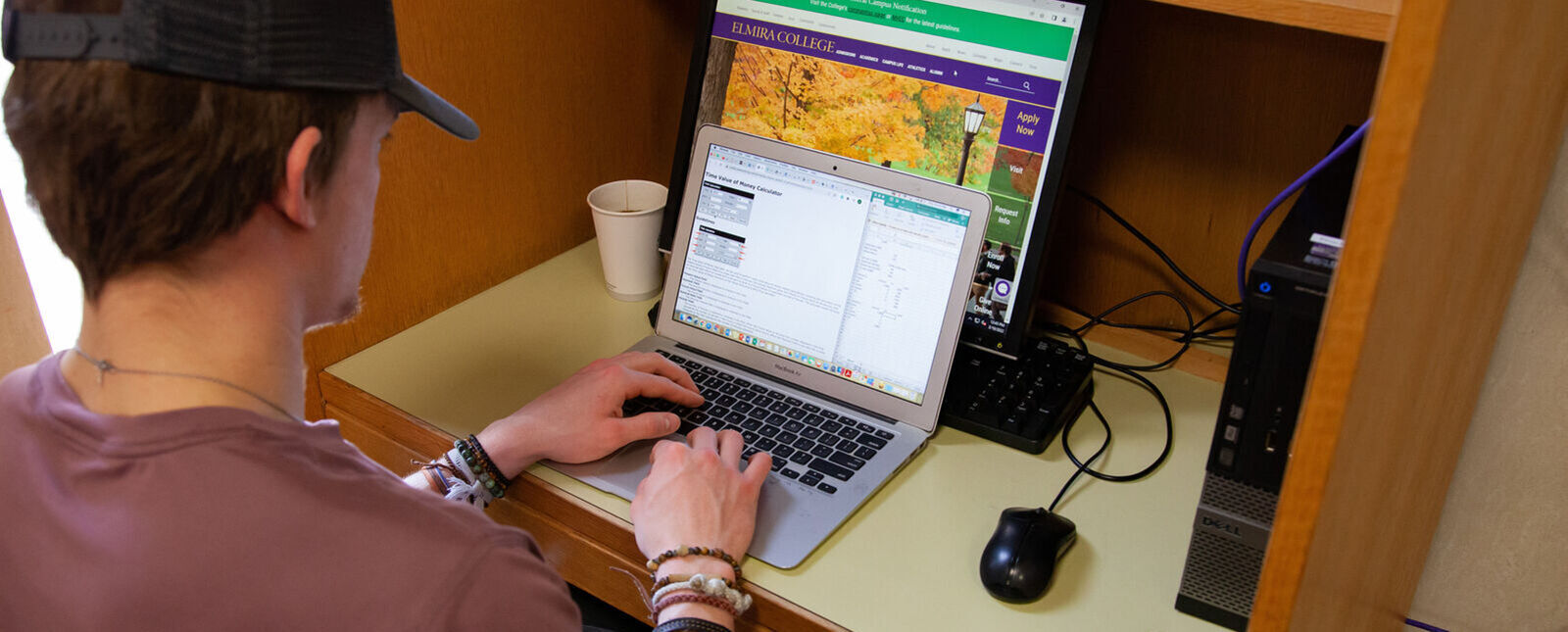 A student works on a laptop