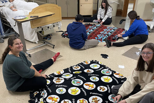 crafting-comfort-elmira-college-nursing-club-creates-warm-gifts-for-children