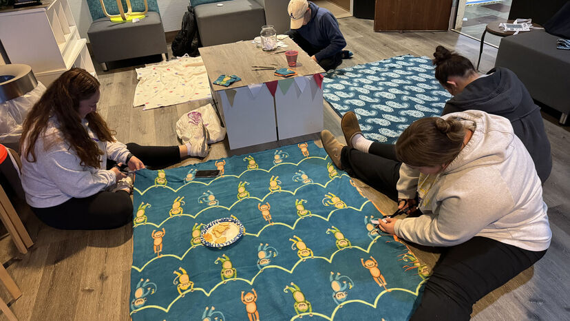 Tying Up Comfort: Elmira College Nursing Club Wraps Kids in Warmth