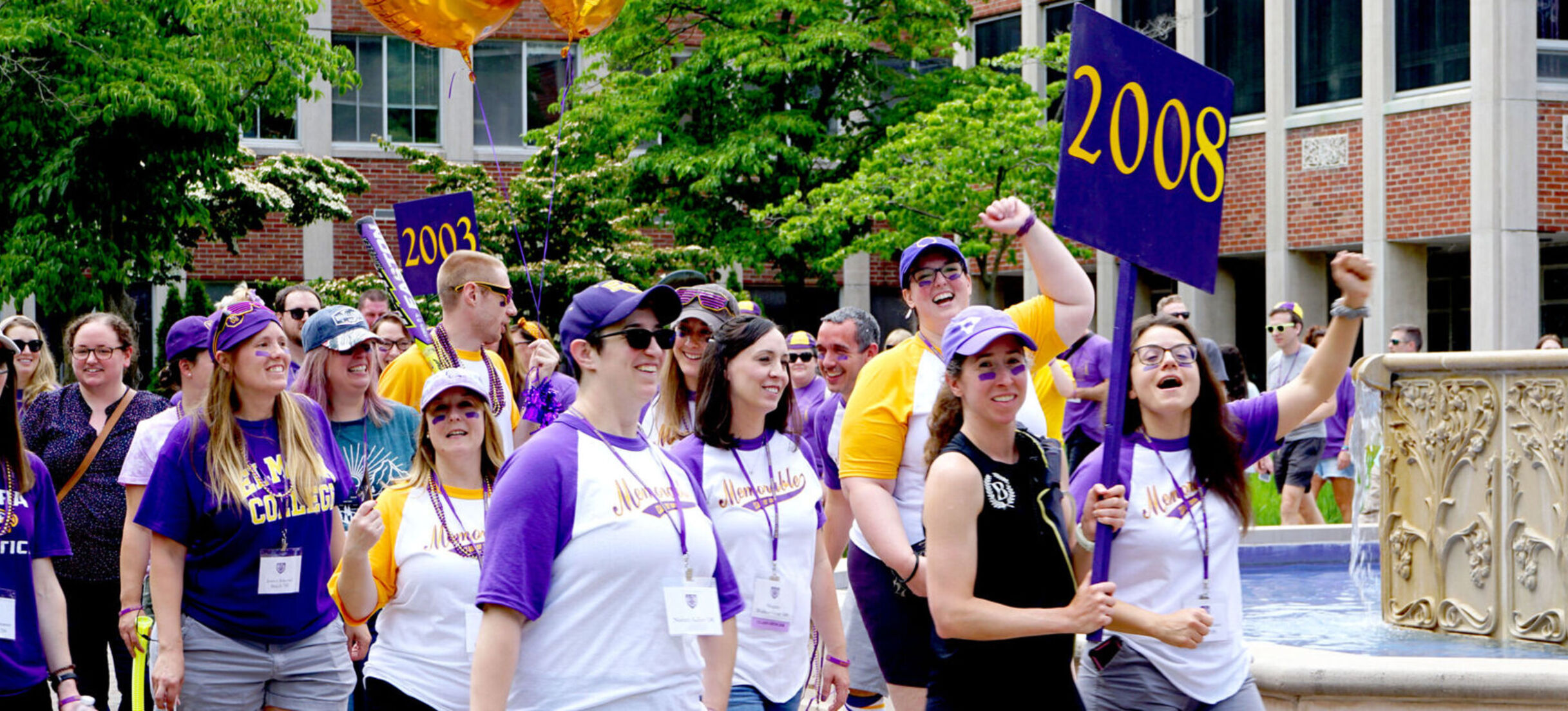 Members of the Class of 2008 cheer as they march in the Reunion 2023 parade