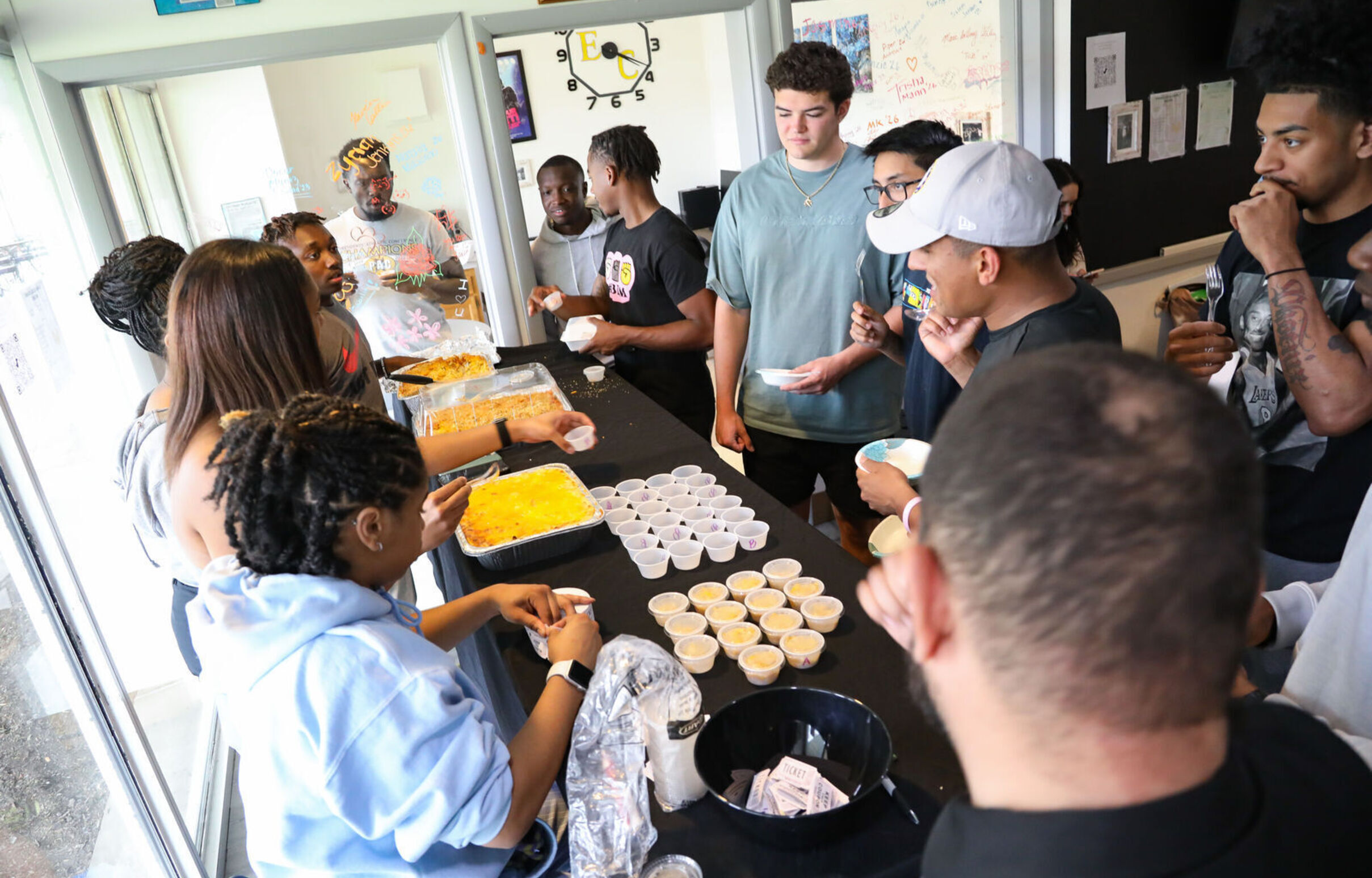 People try samples of macaroni and cheese during the BSU's Mac Off
