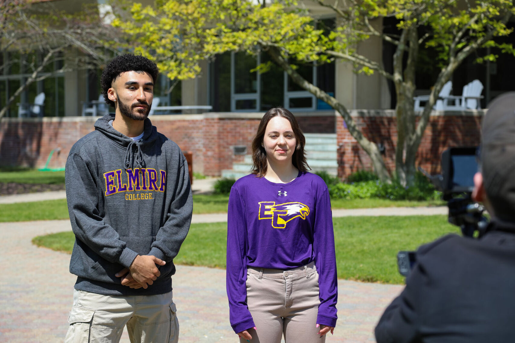 Elmira College students filming on campus. 