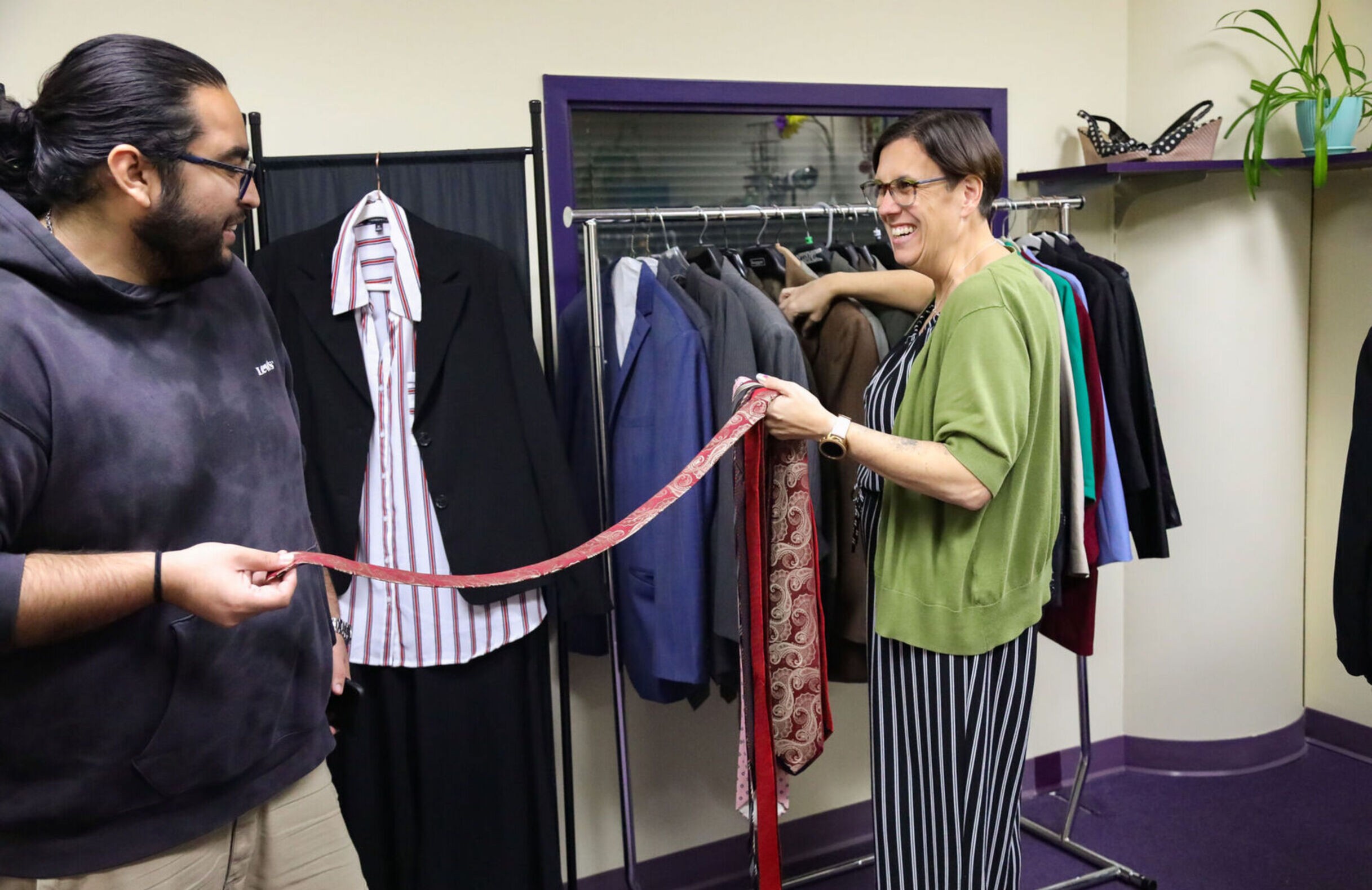 A career counselor helps a visitor in the Career Closet