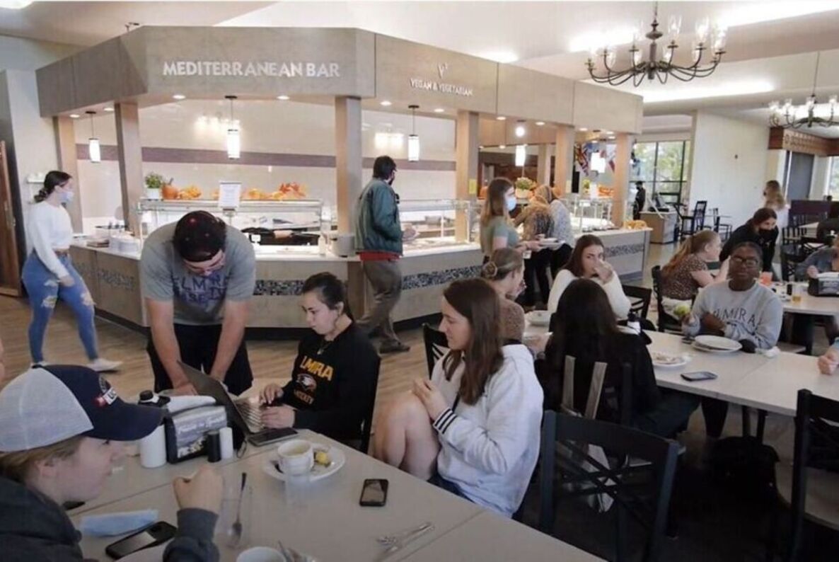Students enjoy a meal in the dining hall