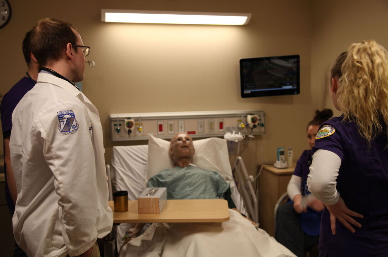 Nursing and LECOM students practice caring for a patient