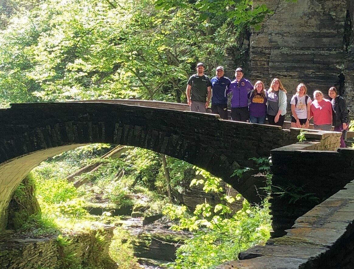 EC Students on stone bridge