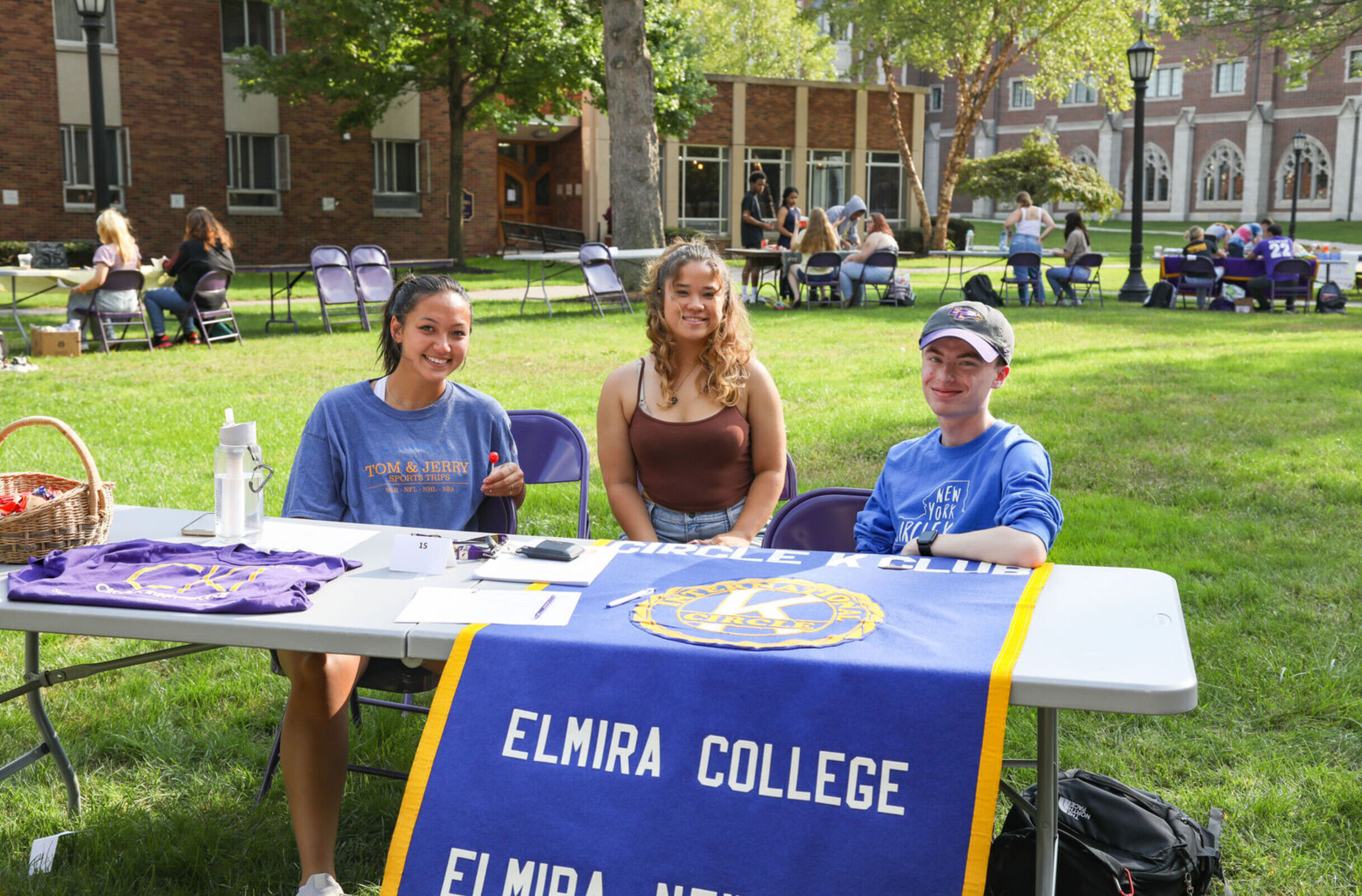 Members of Circle K sit at a table during the Engagement Fair 