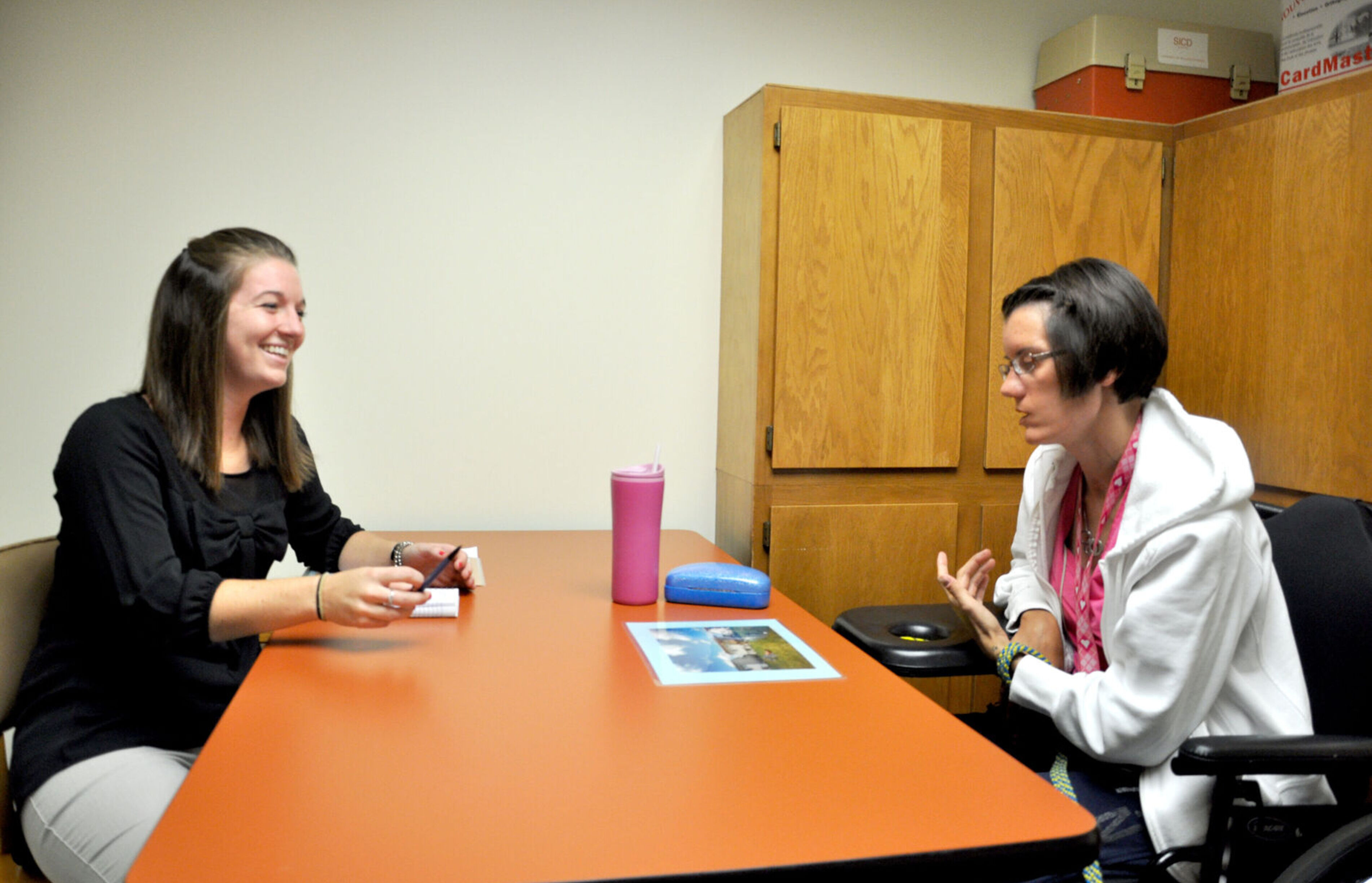 A student works with a client in the Elmira College Speech and Hearing Clinic