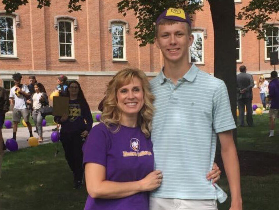 - Wendy Slater '93, MSEd '98 stands with son Zackarie Stedge '21 on the lawn outside of Cowles Hall